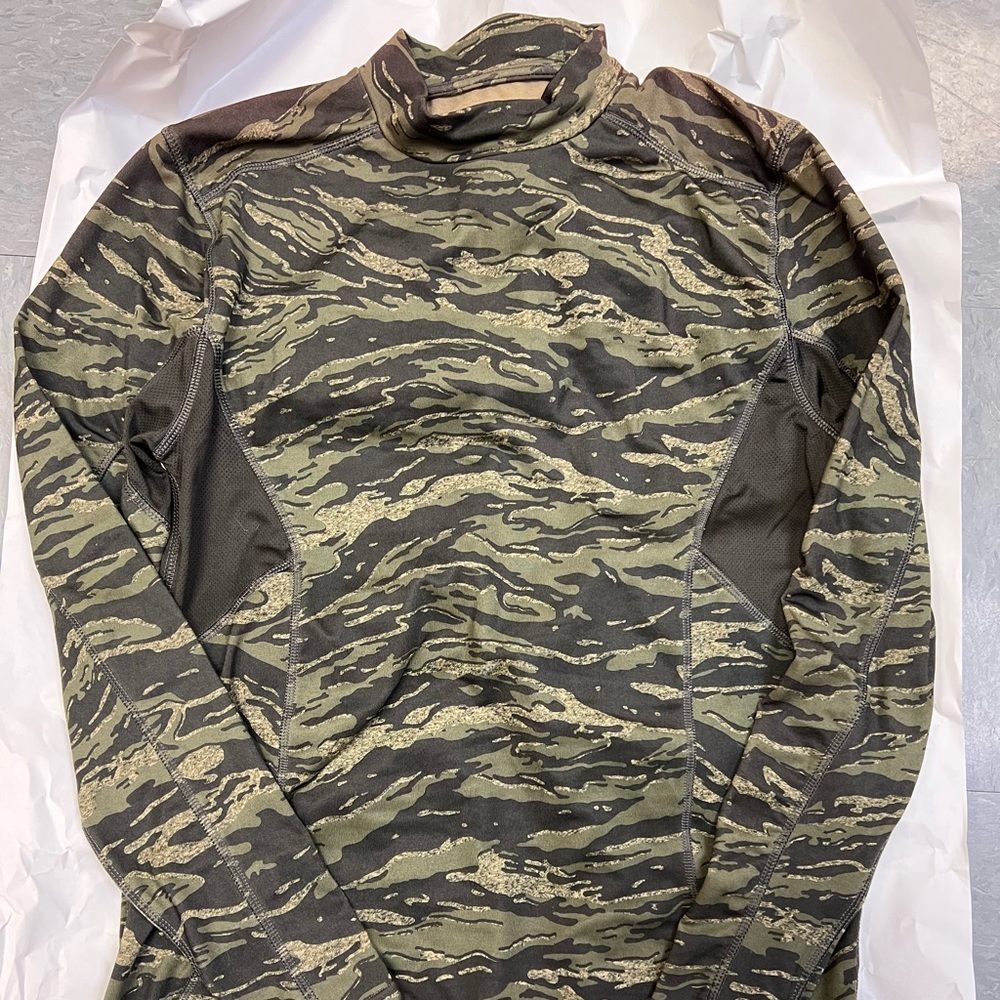 Men’s compression shirt. Nice, thick and warm. Medium